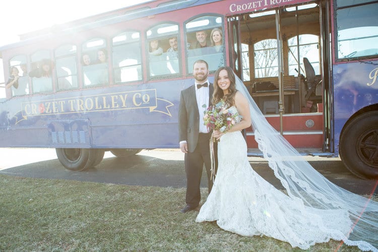 Wedding couple beside the trolley