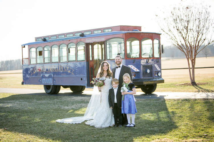 Wedding party in front of trolley